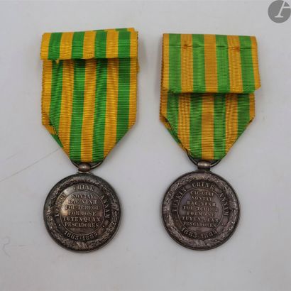 null FRANCE 
TONKIN MEDAL (1885)
Two silver medals by Lemaire, models for the army...