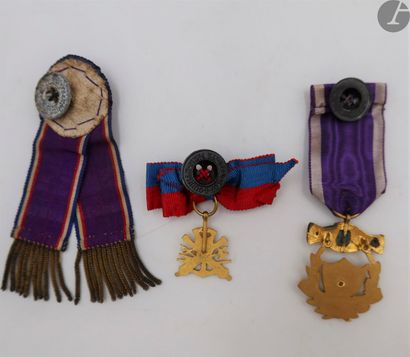 null VETERANS COMBATANTThree
badges: 
- society membership ribbon, possibly Napoleonic...