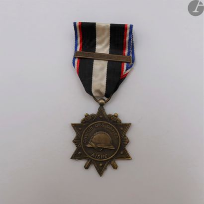 The Vichy regime 

Badge of the Francisque....