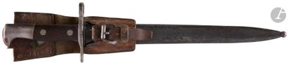 null SUISSE 
Baïonnette modèle 1889-11.
Poignée à plaquettes de bois. Monture en...