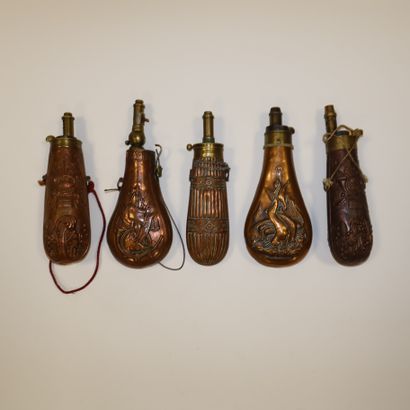 null Set of five copper powder flasks with brass measuring spout 
B.E
.