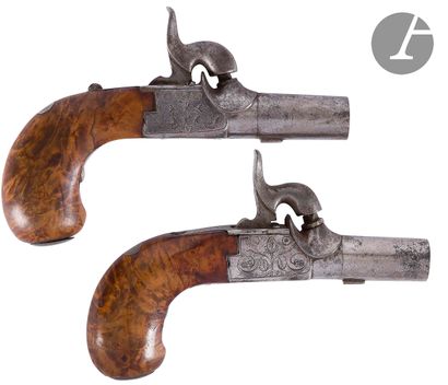 null Pair of percussion pistols.
Round barrels, with forced bullet. Engraved chests...
