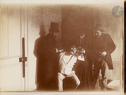 null Unidentified photographer 
Photographic novel of a murder, c. 1900. 
Nine vintage...