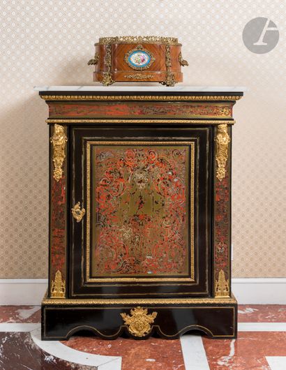 null A pair of red tortoiseshell and engraved brass inlaid furniture, opening to...