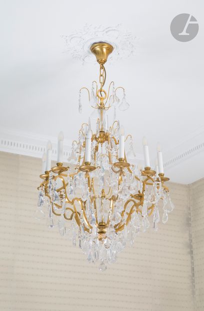 Gilt bronze and cut glass chandelier with...