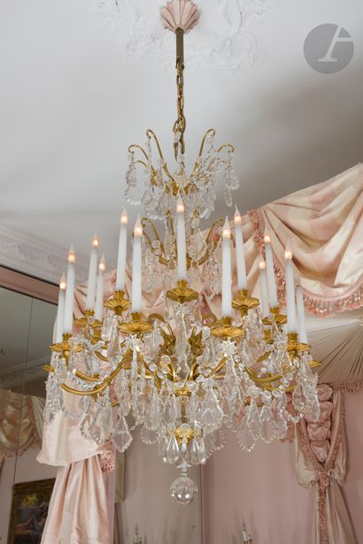 Gilt bronze and cut glass chandelier with...