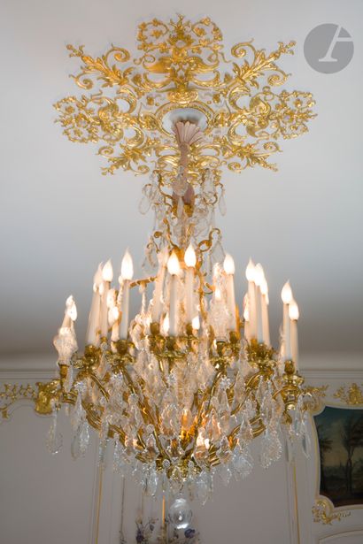 Large gilt bronze and cut glass chandelier...