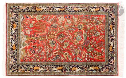 GHOUM, XXth century, silk.
Carpet with red...