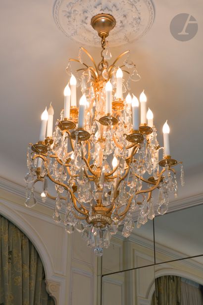 A gilt bronze and cut glass chandelier, with...