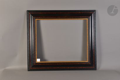 null Molded wood frame with guilloche decoration in the Dutch style of the 17th century....