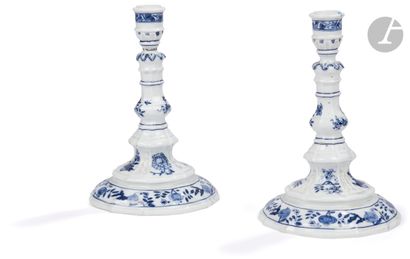 null Meissen
Pair of porcelain torches decorated in blue cameo with flowers and foliage.
Marked:...