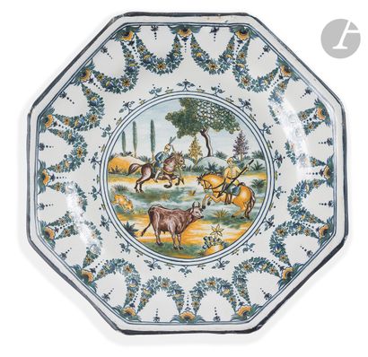 null MOUSTIERS 
Two plates of octagonal shape with cut sides in earthenware, decorated...