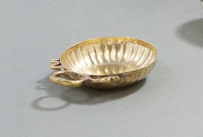 Wine cup with snake handle in brass on a...