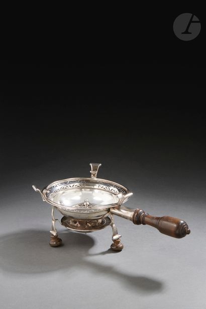 null LILLE 1767 - 1768
Silver ember stove of circular form, resting on three feet...
