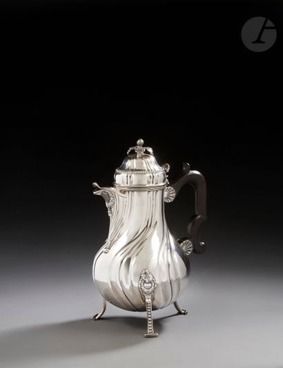 null LILLE 1784
Silver tripod coffee pot, the feet with scrolls and fall of pearls,...