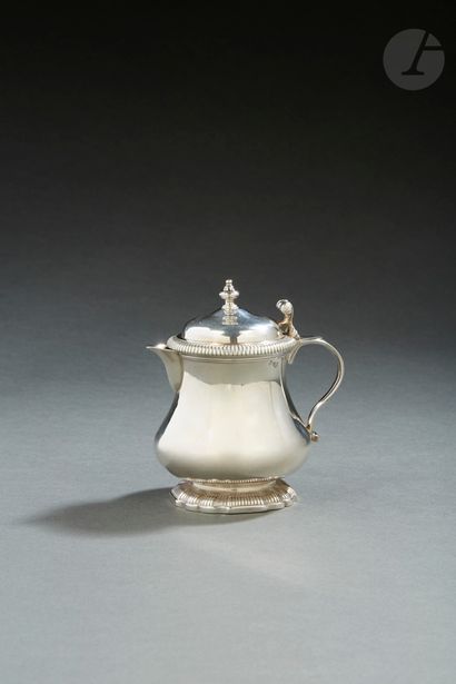 null PARIS 1743 - 1744
Silver creamer/mustard pot, the poly-lobed pedestal with gadroon...