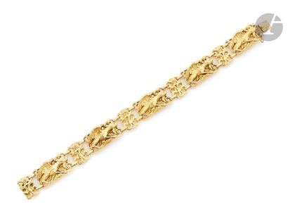 null Gold bracelet 18K (750), articulated links pierced and chiseled chimeras, scandé...