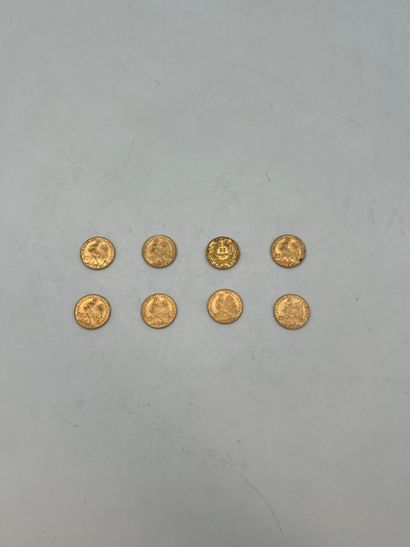 8 pièces de 20 Francs en or 

- 7 pièces...