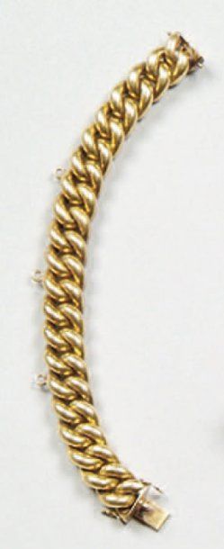 Bracelet articulé en or jaune à maillons...