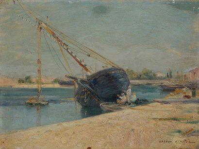 Gaston ROULLET (1847-1925) Bord de Seine, on peint son bateau Huile sur panneau....