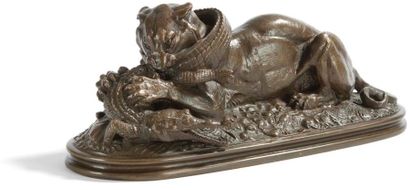 null Antoine-Louis BARYE (1795 - 1875)
Tigre dévorant un gavial
Bronze, patine brun...