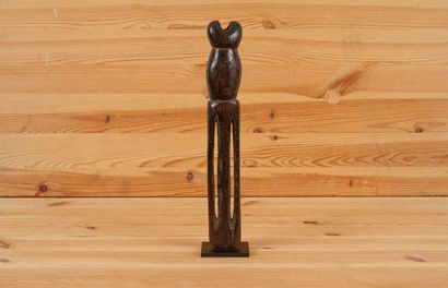 NUNA (Burkina Faso) 
Flûte de chasseur.
En bois à patine brune, représentant un phacochère.
L.:...