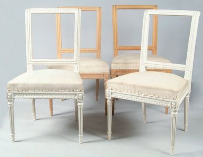 maison JANSEN PARIS Suite de quatre chaises en hêtre mouluré et sculpté de motifs...