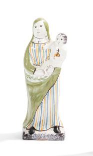 NEVERS 
Statuette de Vierge à l'Enfant en faïence à décor polychrome, la base portant...
