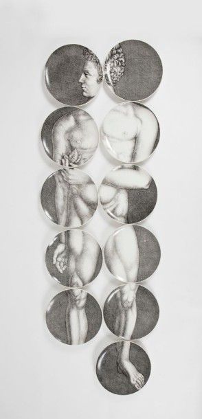 Piero Fornasetti (1913-1988) Série Adam Suite de 11 assiettes en porcelaine à décor...