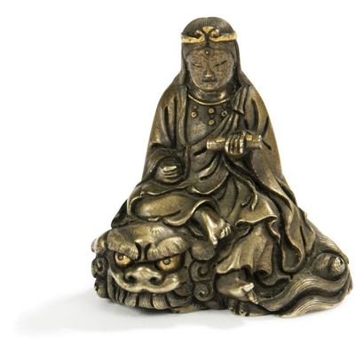 JAPON - XIXE SIÈCLE 
Groupe en bronze, Monju assis sur sa chimère couchée et tenant...