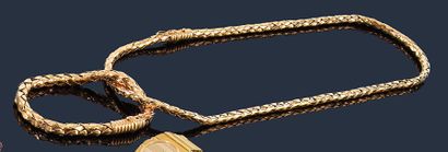 null Demi-parure en or jaune 18K (750‰) tressé comprenant : un collier et un bracelet...