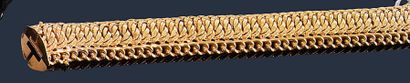 null Bracelet ruban en or jaune 18K (750‰) tressé. 
Longueur : 20 cm environ. Poids...