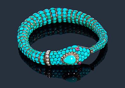 null Bracelet serpent en or 14K (585‰), le corps entièrement serti de turquoises...