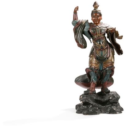 JAPON - XIXe siècle Statuette de Nyo en bois laqué polychrome debout sur un rocher,...