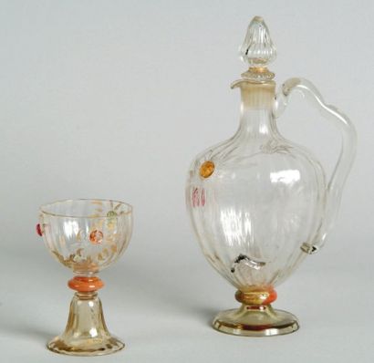 Émile GALLÉ (1846-1904). Verre et carafe, en cristal côtelé transparent gravé de...