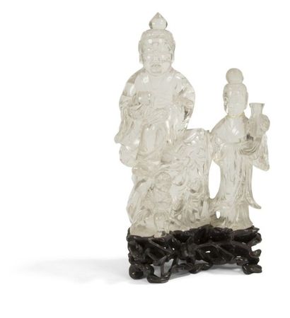 null CHINE - Début XXe siècle
Groupe en cristal de roche, bouddha assis sur un rocher,...