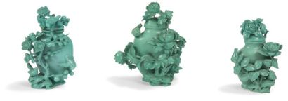 null CHINE - XXe siècle
Trois petits vases en turquoise à décor sculpté en relief...