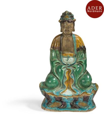 null CHINE - Époque MING (1368 - 1644)
Statuette de bouddha en terre cuite émaillée...