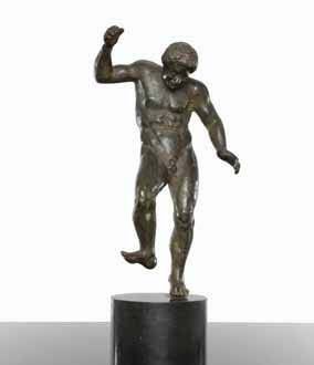 null Statuette en bronze représentant un homme nu dansant d'après l'antique. XIXe...