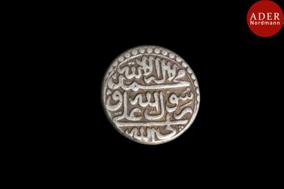 null Sekkeh iranien en argent, au nom du 8e Imam chiite (d.818), daté 117[0] H. /...