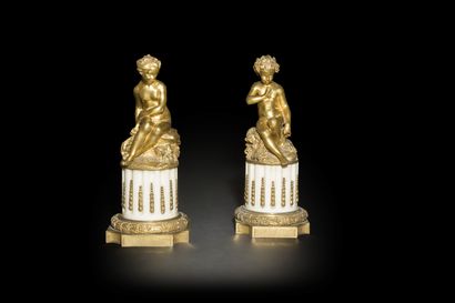 null Paire de figures de jeune fille et jeune garçon en bronze doré reposant sur...