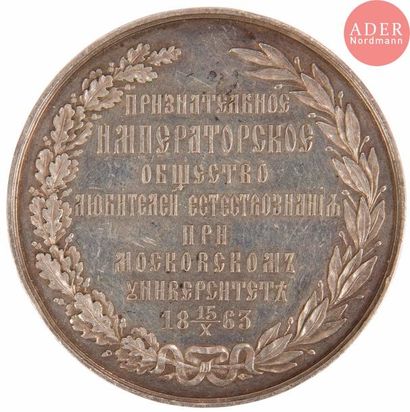 null Médaille de récompense pour l’exposition ethnographique de 1867.
Argent. Sans...