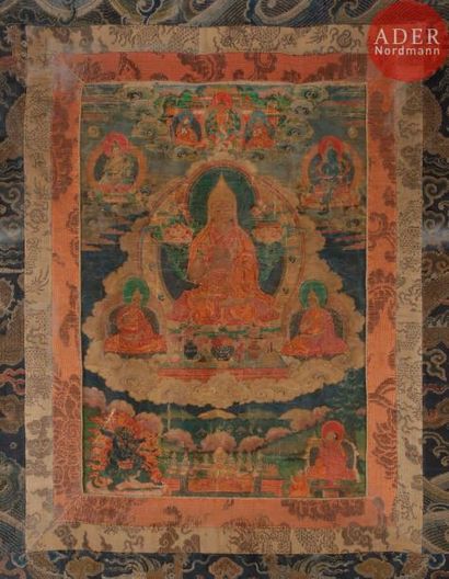 null TIBET - XVIIIe siècle
Tangka, détrempe sur toile. Le lama Tsongkhapa, dans un...