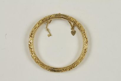 null Bracelet jonc en or 18K (750 ‰), ciselé et ajouré. Longueur : 21 cm environ....