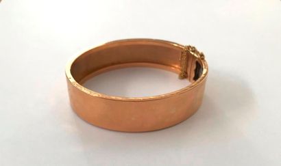 null Bracelet jonc plat ouvrant en or rose 18K (750 ‰). 
Poids : 18,1 g (enfoncements,...
