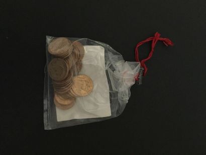  30 pièces de 20 Francs en or dans un sachet scellé (12.12.1986) et numéroté 2017059...