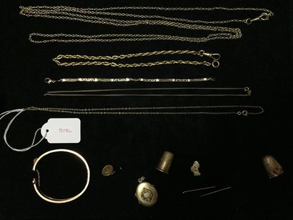 null Lot d'or : deux chaines de montres, un bracelet articulé rigide, un pendentif...