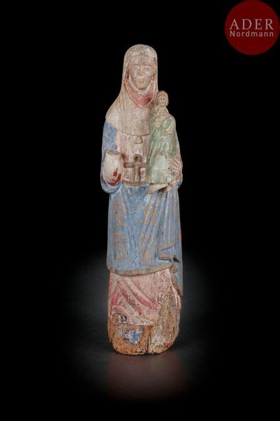 Vierge à l’Enfant en bois sculpté et polychromé....