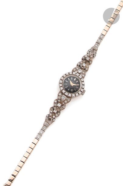 null GUBELIN. Vers 1950
N°167344
Montre bracelet pour femme en or gris 18K (750),...