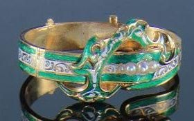 null Bracelet ruban articulé en or jaune émaillé vert et blanc, le centre formant...
